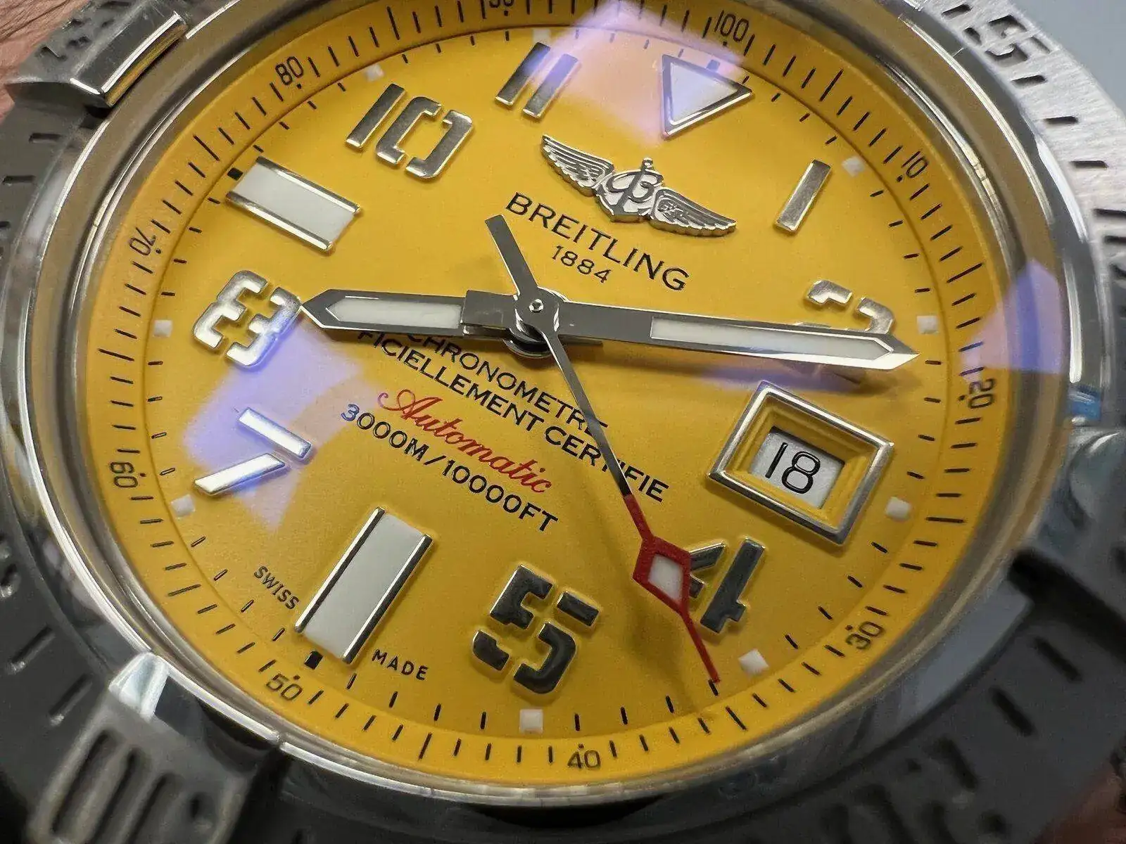 (18) Osmpo - Breitling yellow.jpeg