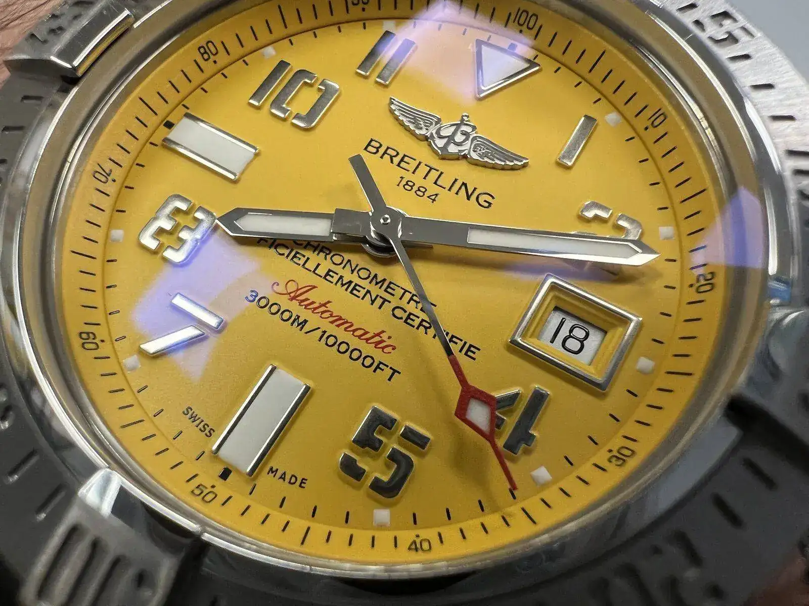(18) Osmpo - Breitling yellow.webp