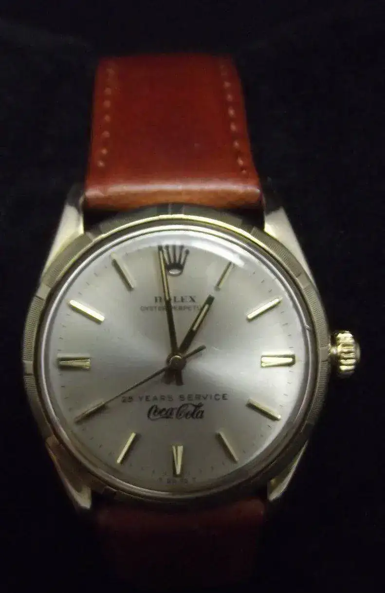 1coca+cola+logo+rolex+1003.webp