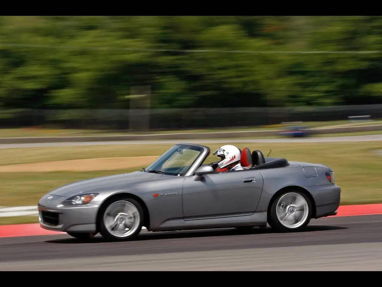 2008-Honda-S2000-Side-Angle-Speed-1280x960.webp