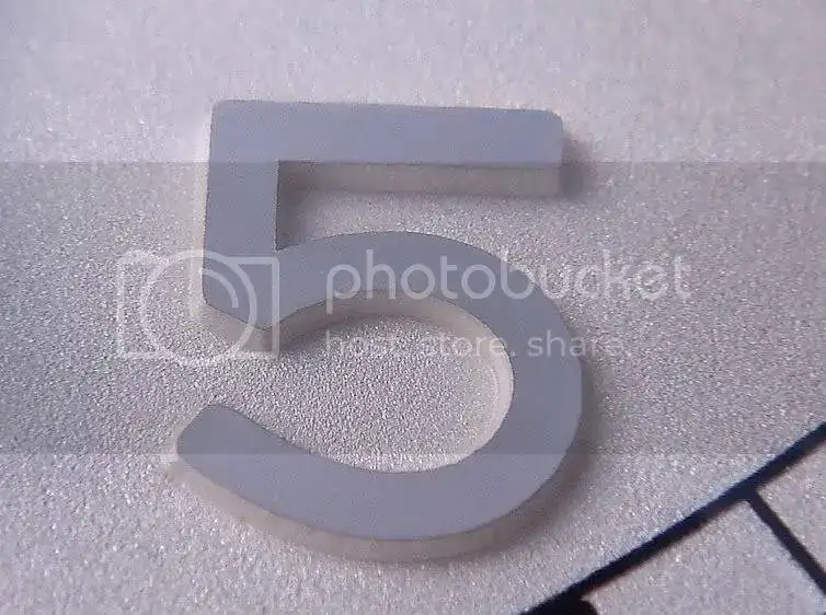 5-raised-numeral-close.webp