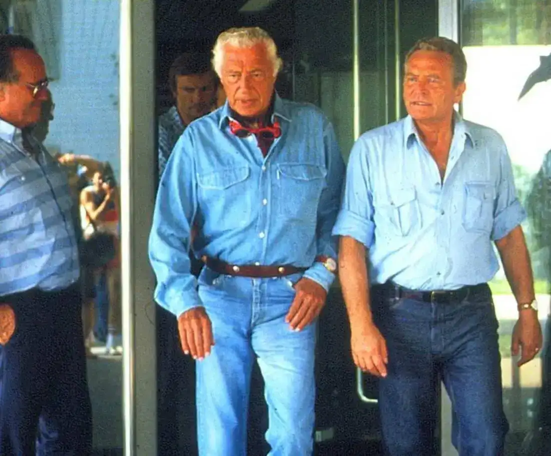 Agnelli-in-washed-denim-with-watch-on-top-of-shirt-cuff.webp