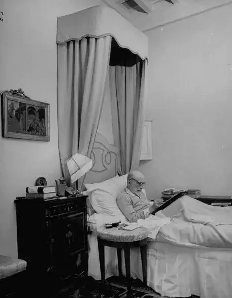 Art critic Bernard Berenson writing in bed at his villa, I Tatti. italy 1948.webp