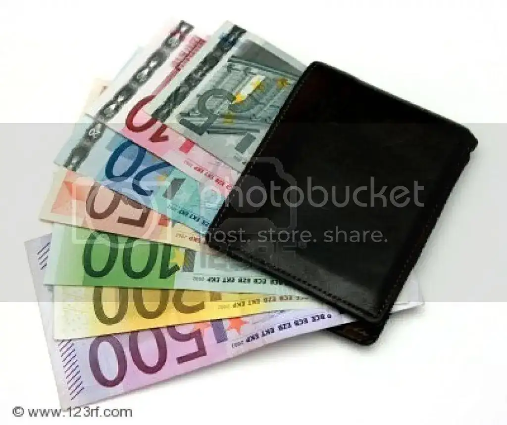 billetera-llena-de-dinero_zps02ad772e.webp