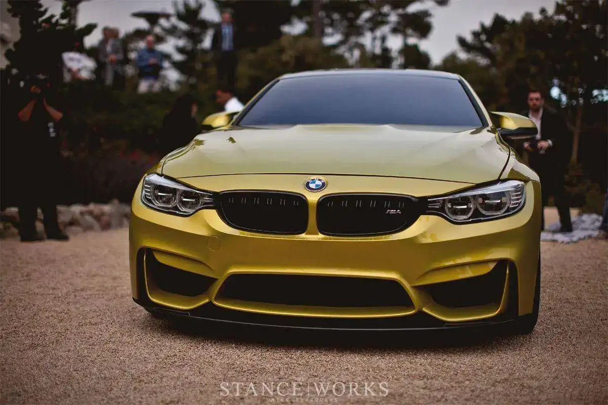 bmw-m4-concept-unveiled-yellow-coupe.webp