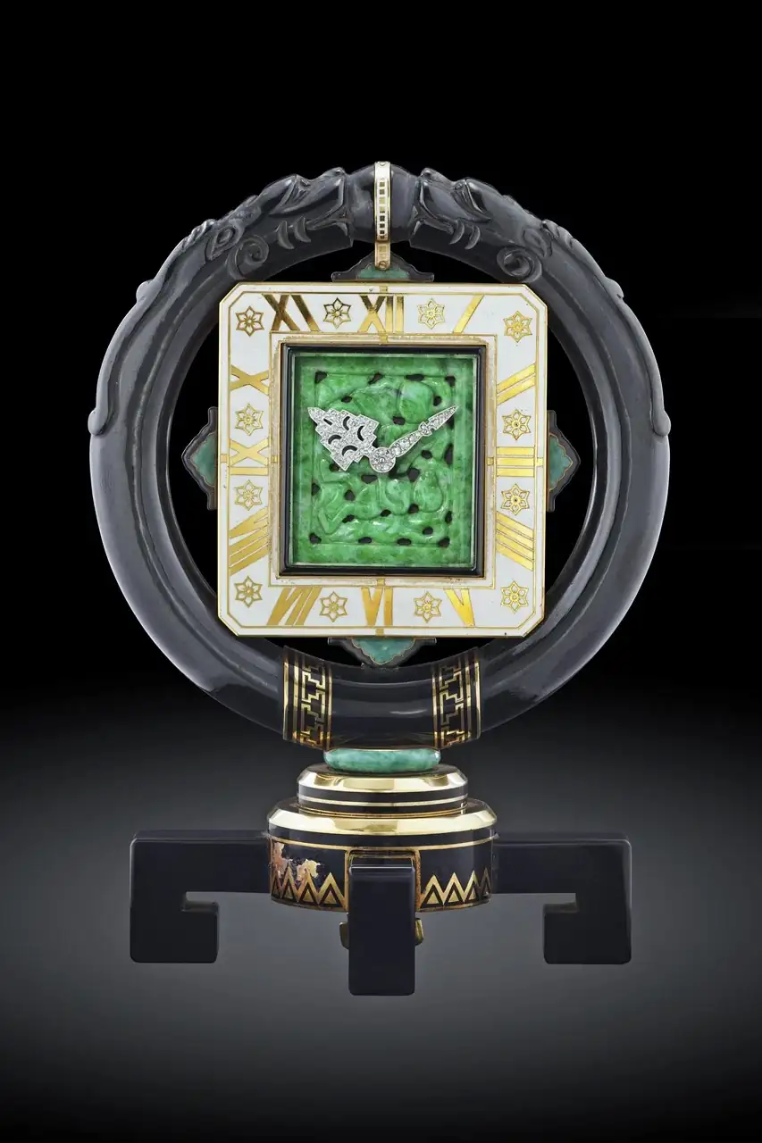 Cartier reloj de sobremesa ambar rojo.webp