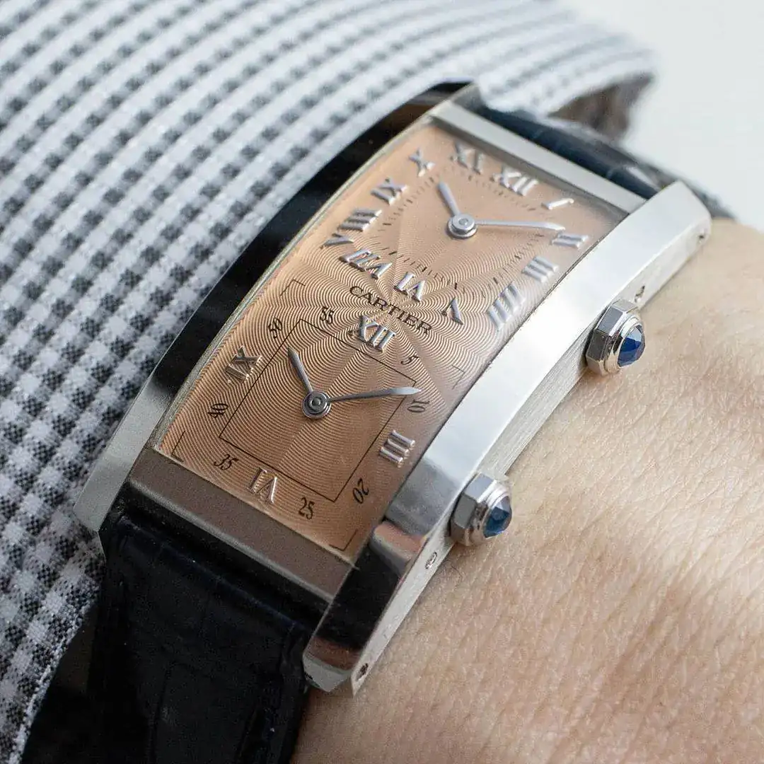 Cartier-Tank-Cintrée-Dual-Time-Zone-salmon-dial.webp