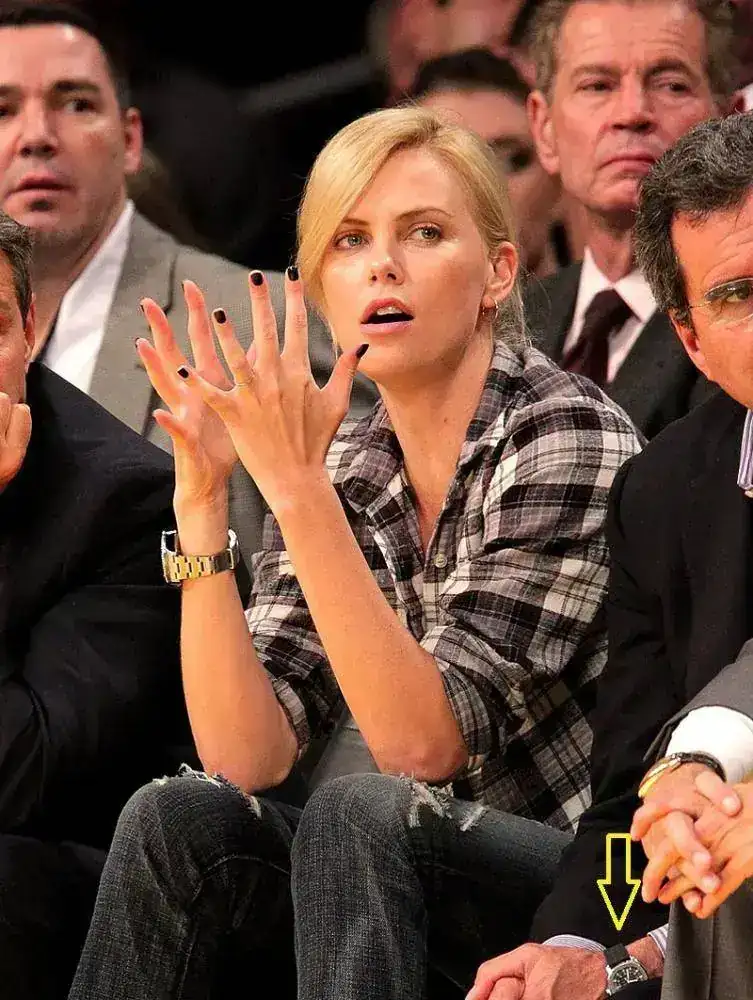 Charlize-Theron-Rolex-DEEP-SEA-Lakers-Game-Clapping.webp