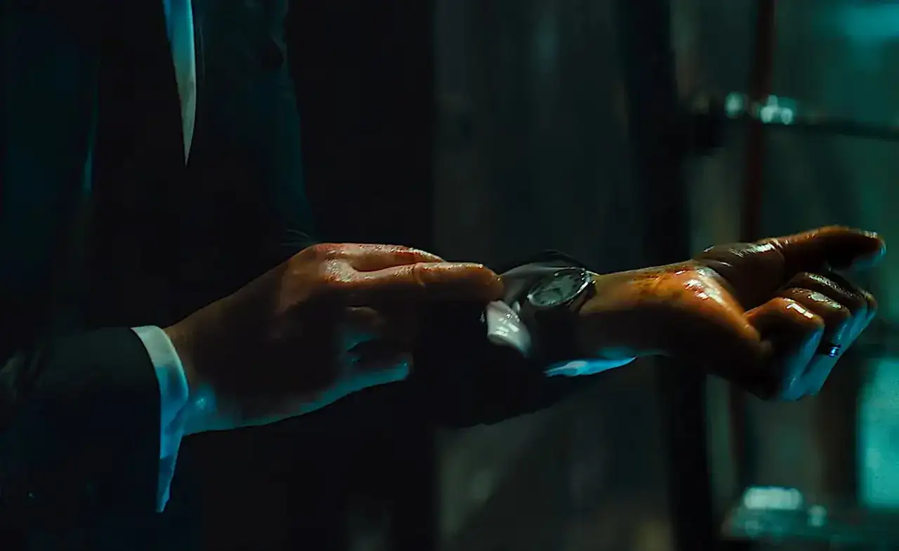 Checking-His-Wrist-Watch-In-John-Wick-3-Parabellum.webp