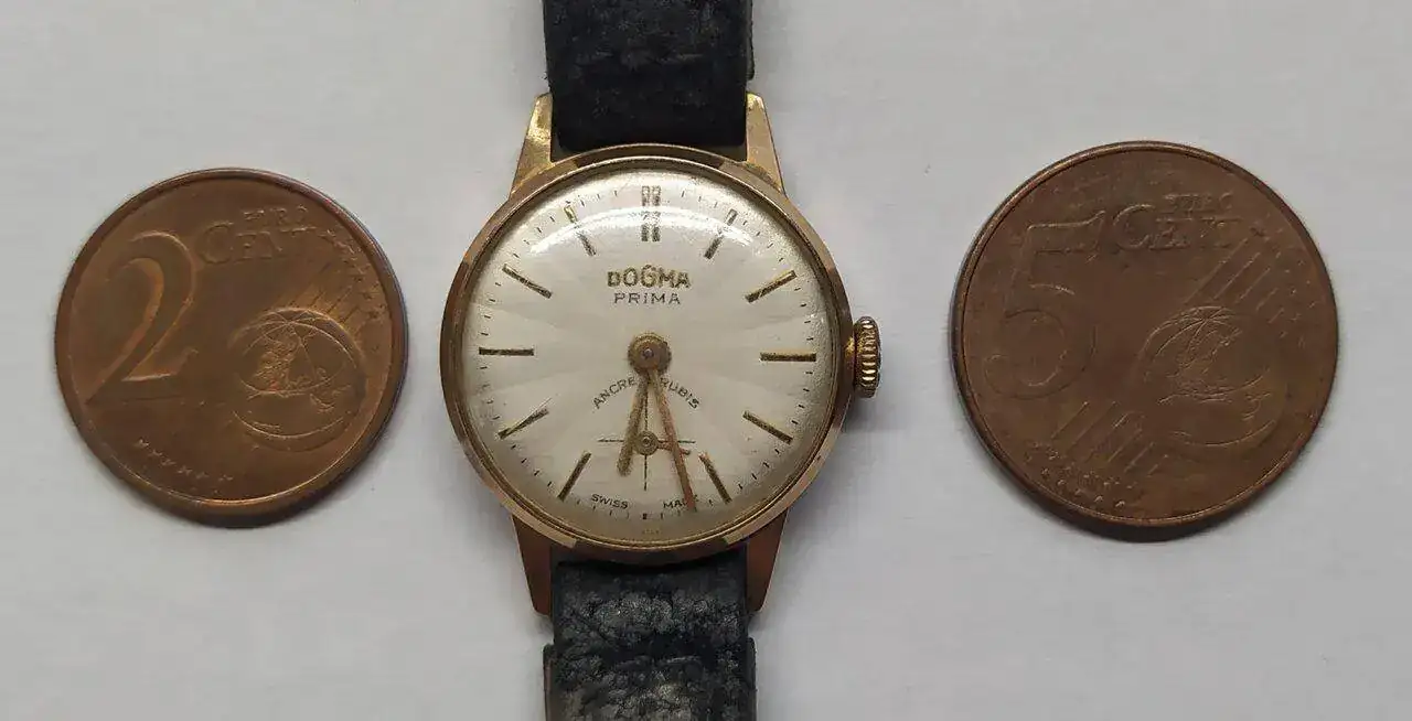 dogma monedas.webp