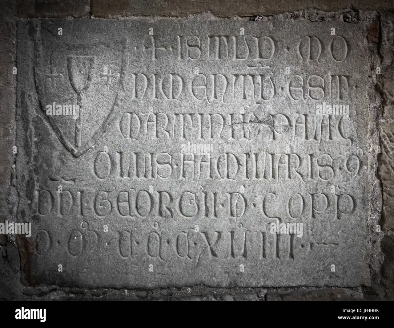 engraved-stone-with-latin-letters-JFHHHK.webp