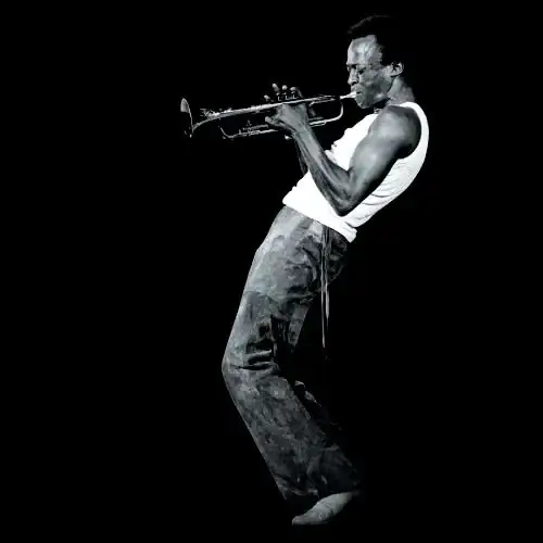 f98f6270edc94e0918a397cc--jack-johnson-miles-davis.webp