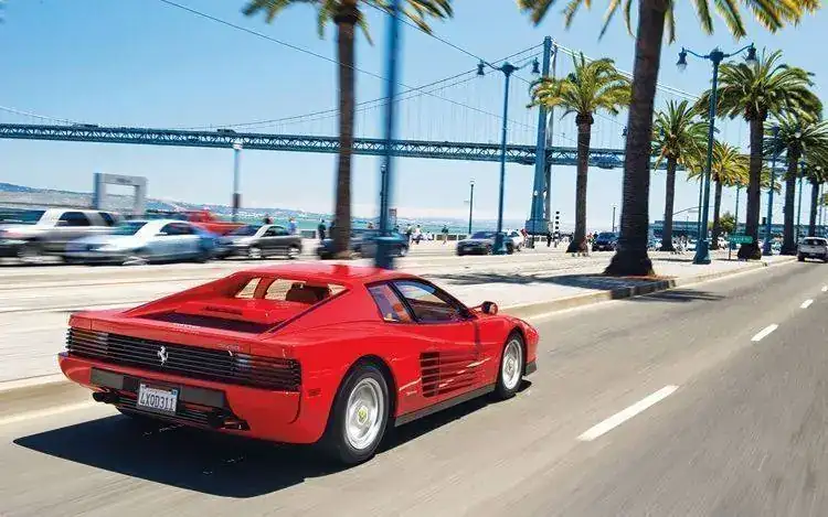 ferrari testarossa+rear_three_quarter_view.webp