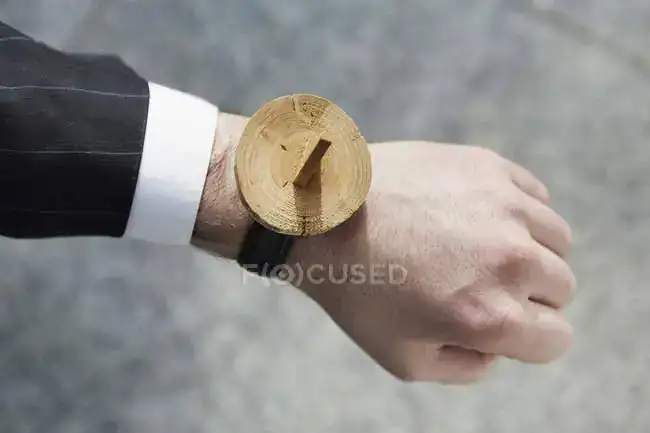 focused_184435800-stock-photo-human-hand-sundial-wrist-watch.webp