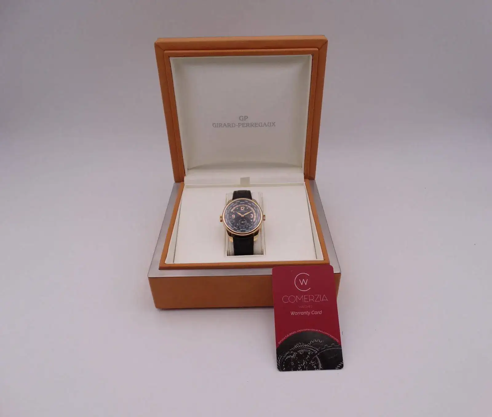 GIRARD PERREGAUX WW.TC World Time Small Second Gold 01549.webp
