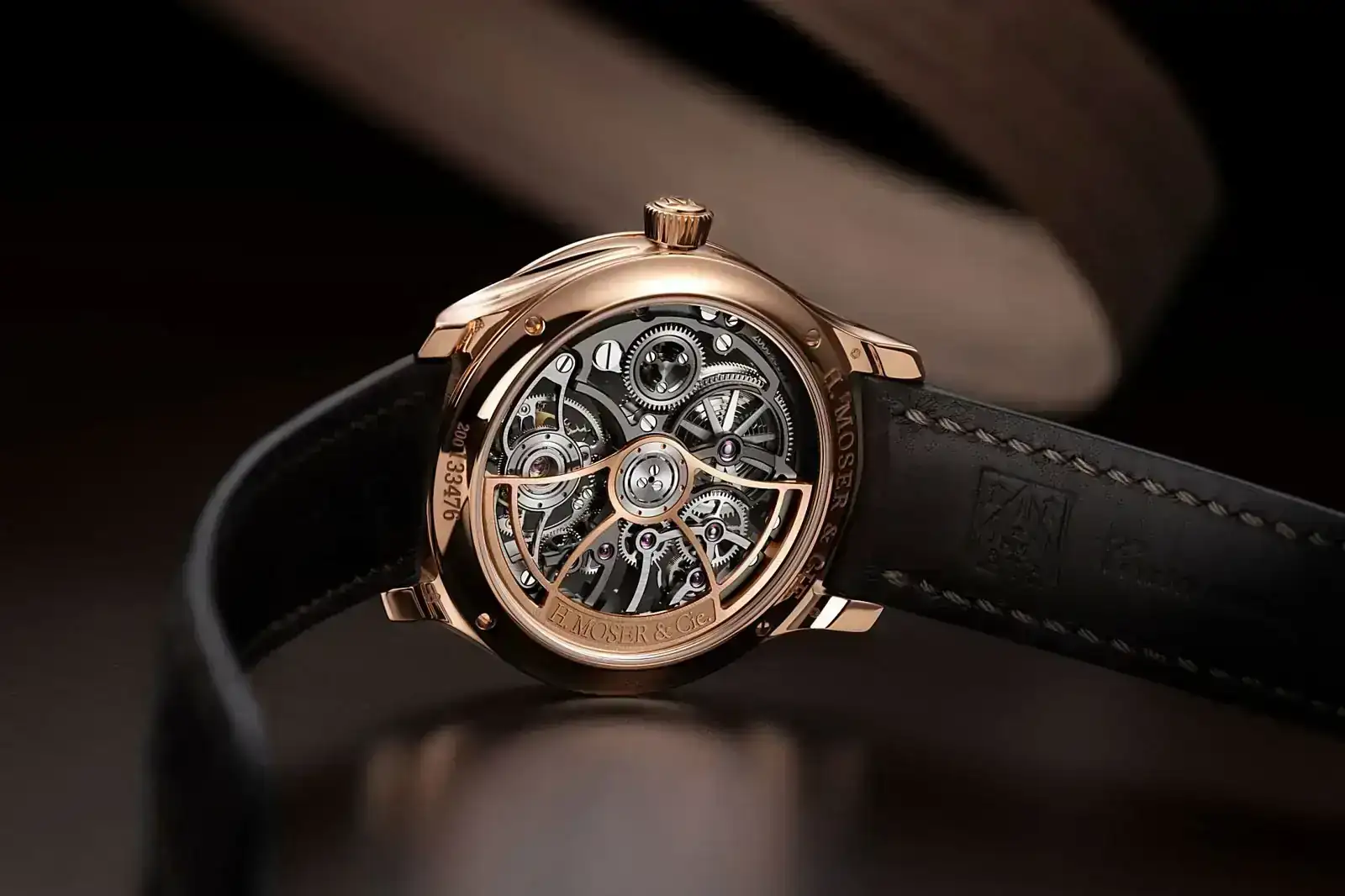 HMoser_1814-0400_Endeavour_Tourbillon_RG_Skeleton__Lifestyle_caseback.webp