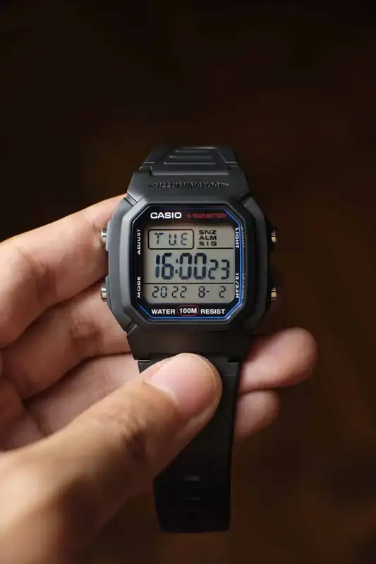 Holding-the-Casio-W-800-H.webp