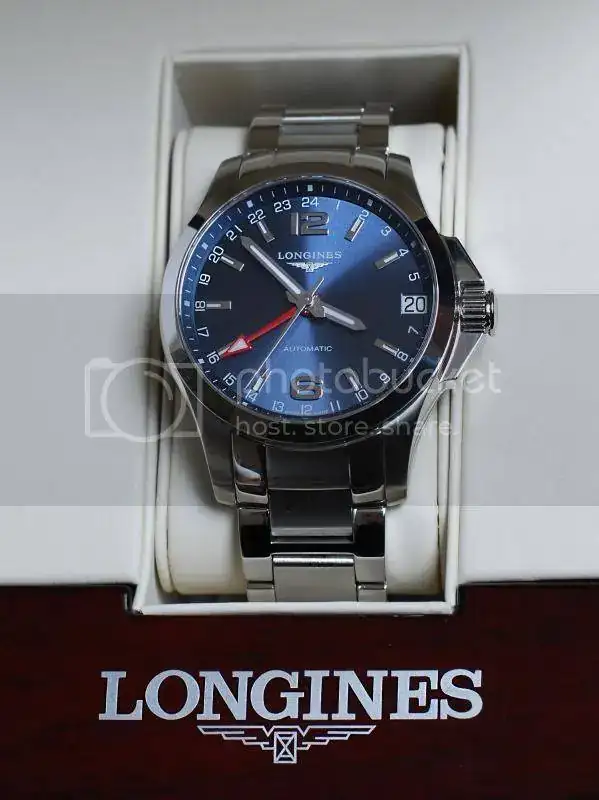 L36874996LonginesConquestautomaticGMTbluedial01.webp