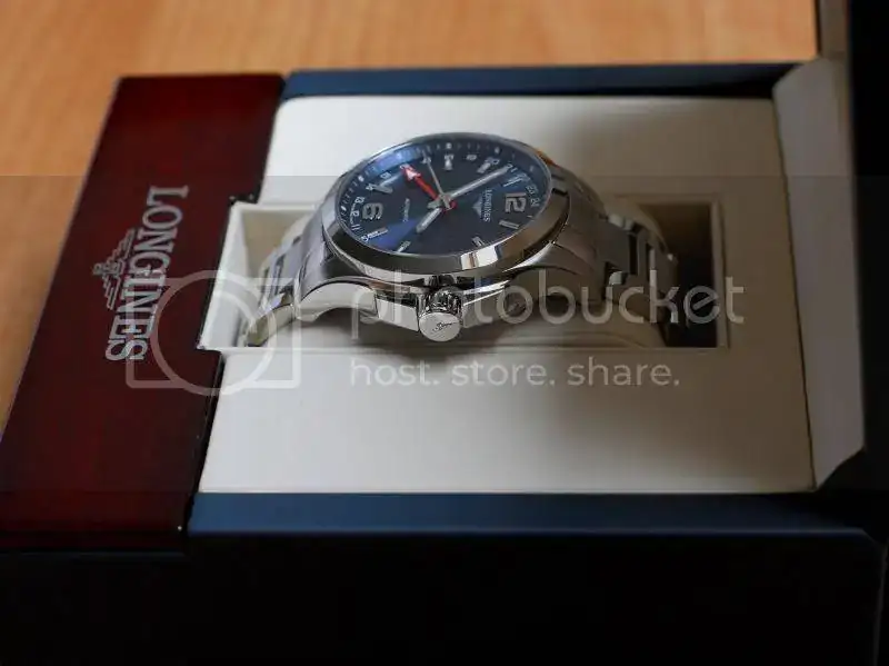 L36874996LonginesConquestautomaticGMTbluedial02.webp