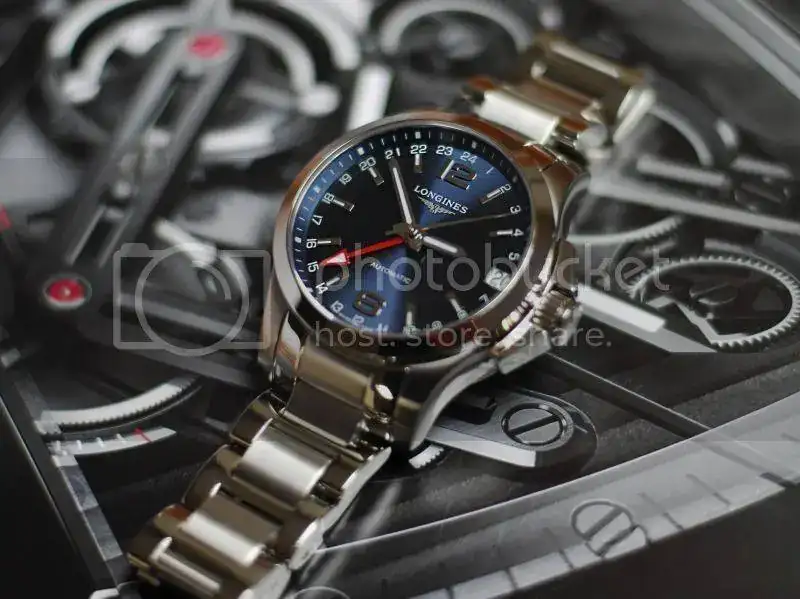 L36874996LonginesConquestautomaticGMTbluedial04.webp