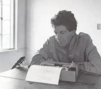 leonard-cohen-and-his-typewriter.webp