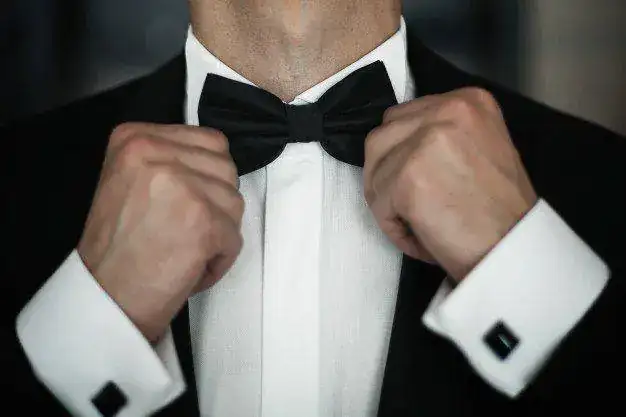 man-fies-black-bow-tie-on-white-shirt_8353-52.webp