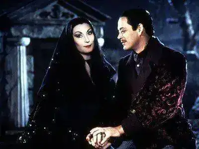 Morticia-and-Gomez-addams-family-5616535-400-300.webp