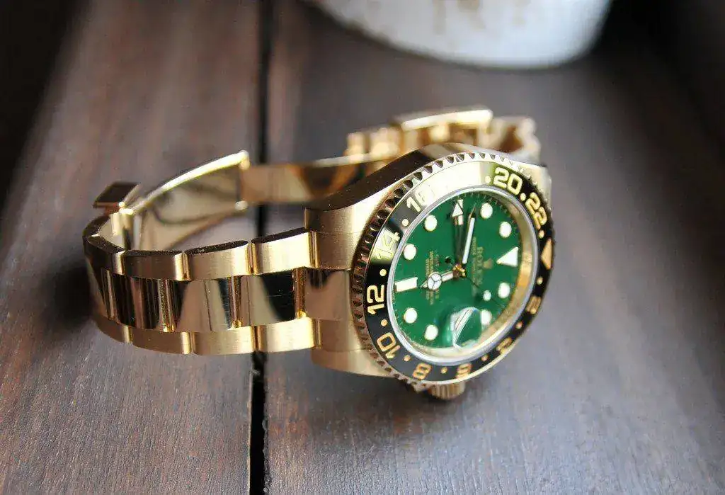 MT-Master-II1-rolex-gold-watch-green-dial-1024x699.webp