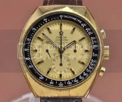 omega%20mark%20II%20dorado%20bisel%20negro.webp