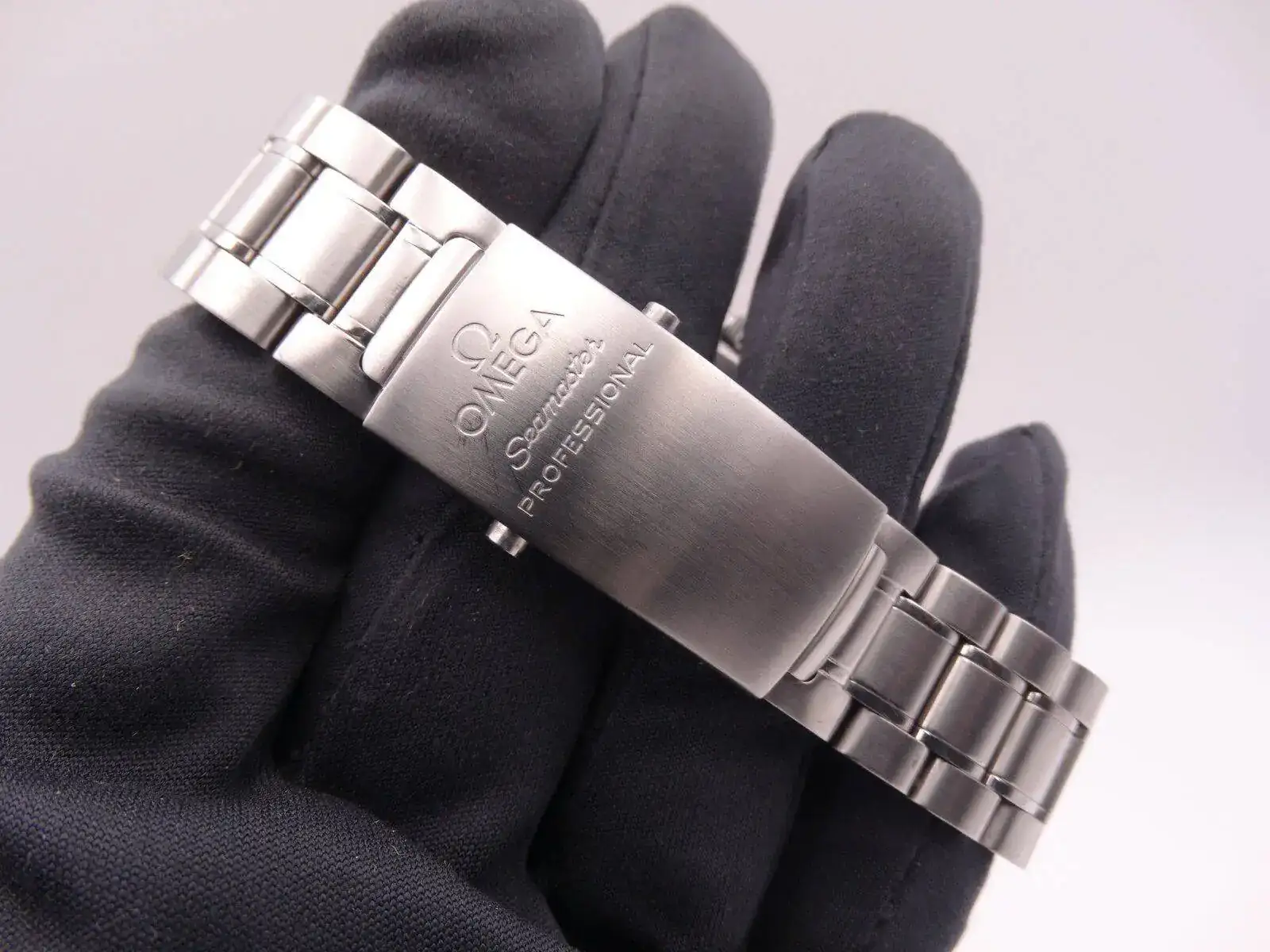 Omega Seamaster Diver 300m GMT 50th Anniversary 07818.webp