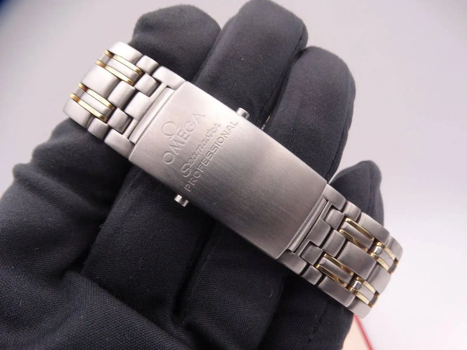 Omega Seamaster Diver 300m Steel Gold 09728.JPG