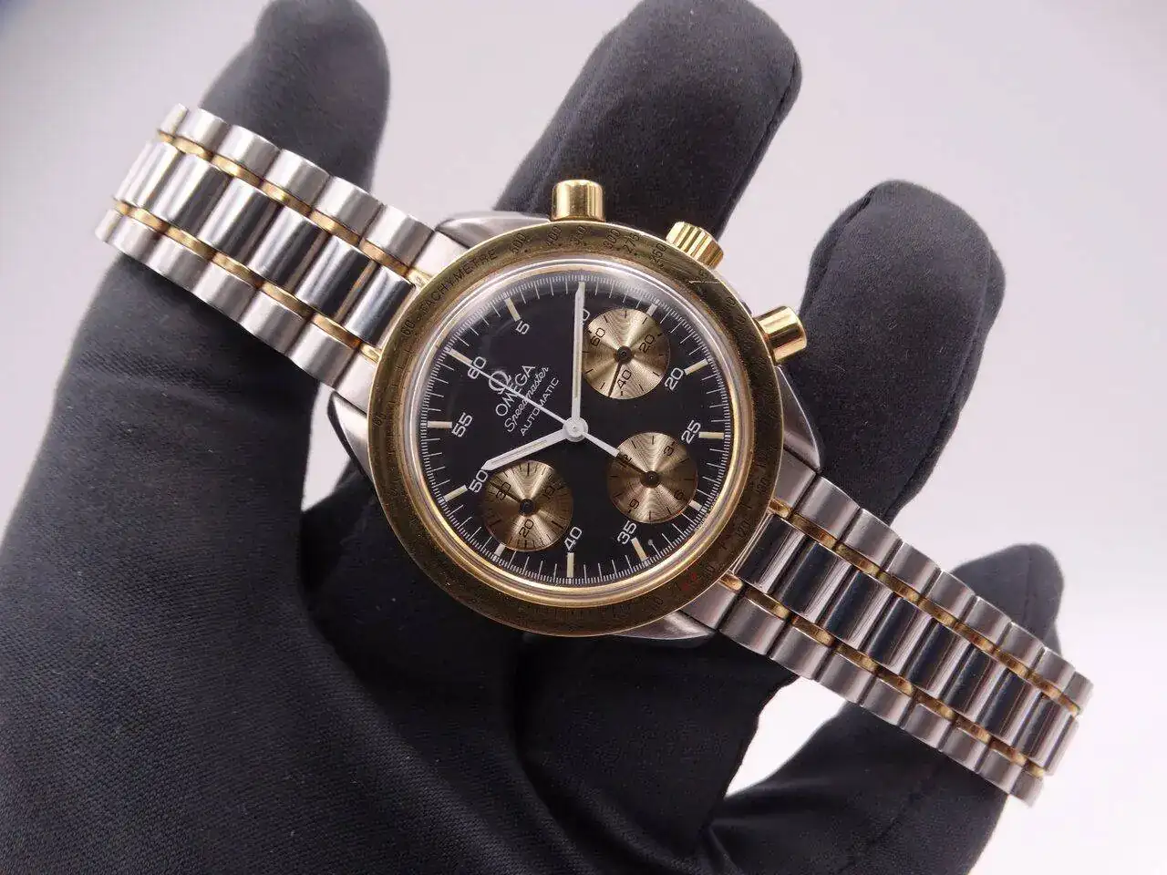 Omega Speedmaster Automatic Steel Gold 03776.webp