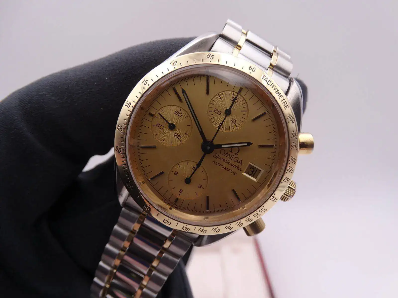 Omega Speedmaster Date Automatic Steel Gold 04055.webp