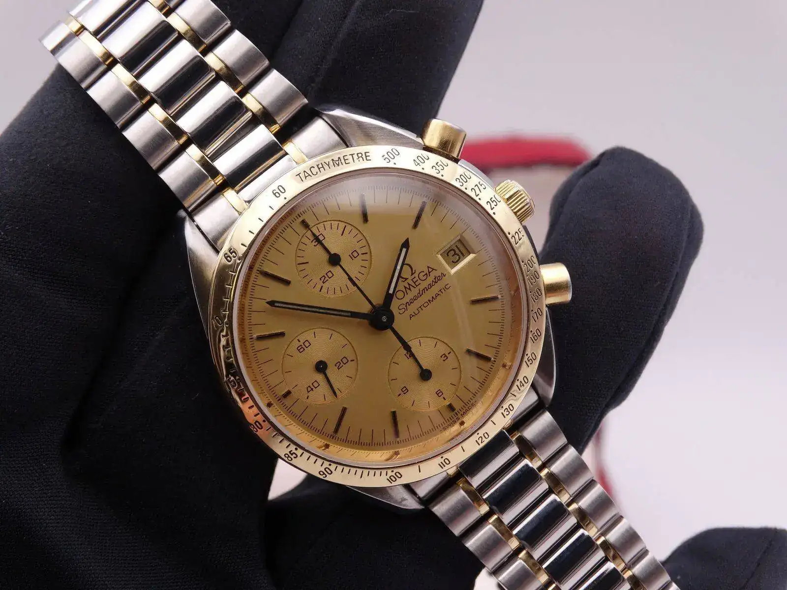 Omega Speedmaster Date Automatic Steel Gold 04075.webp