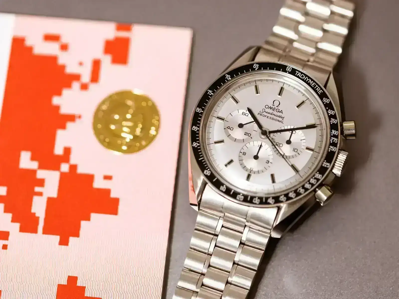 omega-vintage-speedmaster-apollo-xi-mark-1-only-20-pieces-ref-345-0802-18k-white-gold-papers-...webp