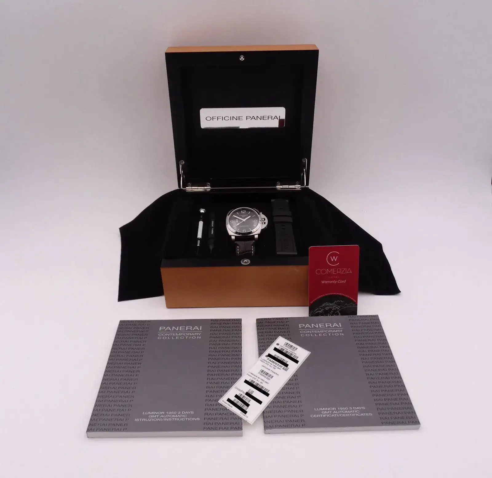 Panerai Luminor 1950 GMT Pam 320 06569 copia.webp