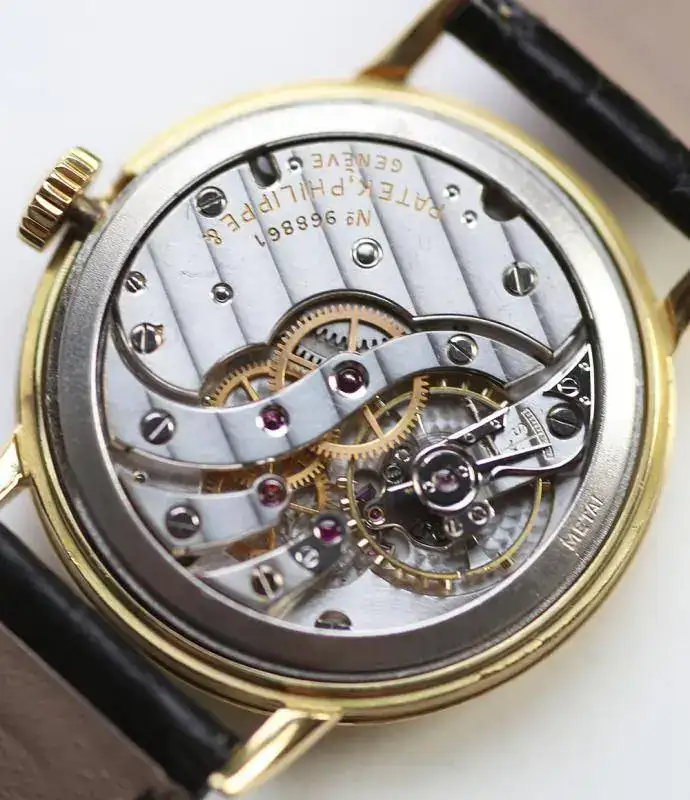 Patek-Philippe-Calatrava-1513-manual-winding-18-carat-yellow-gold-vintage-preowned-luxury-wat...webp