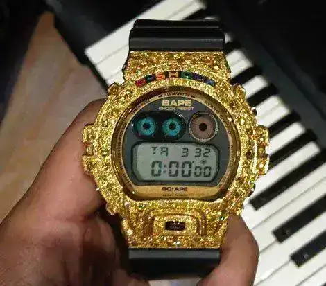 pharrell-gold-bape-casio-gshock-dw-6900.webp