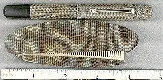 PLK 101N lizard con peine gopens c38m2006 .jpg