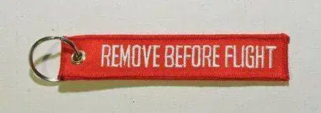 portachiavi_remove_before_flight.webp