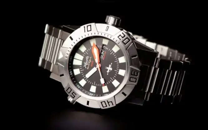 reloj_xerfa_aguja_naranja.webp