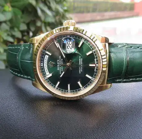ROLEX-OYSTER-DAYDATE-GREEN-GOLD-118138-PRICE-BASELWORLD-HANDS-ON-2.webp