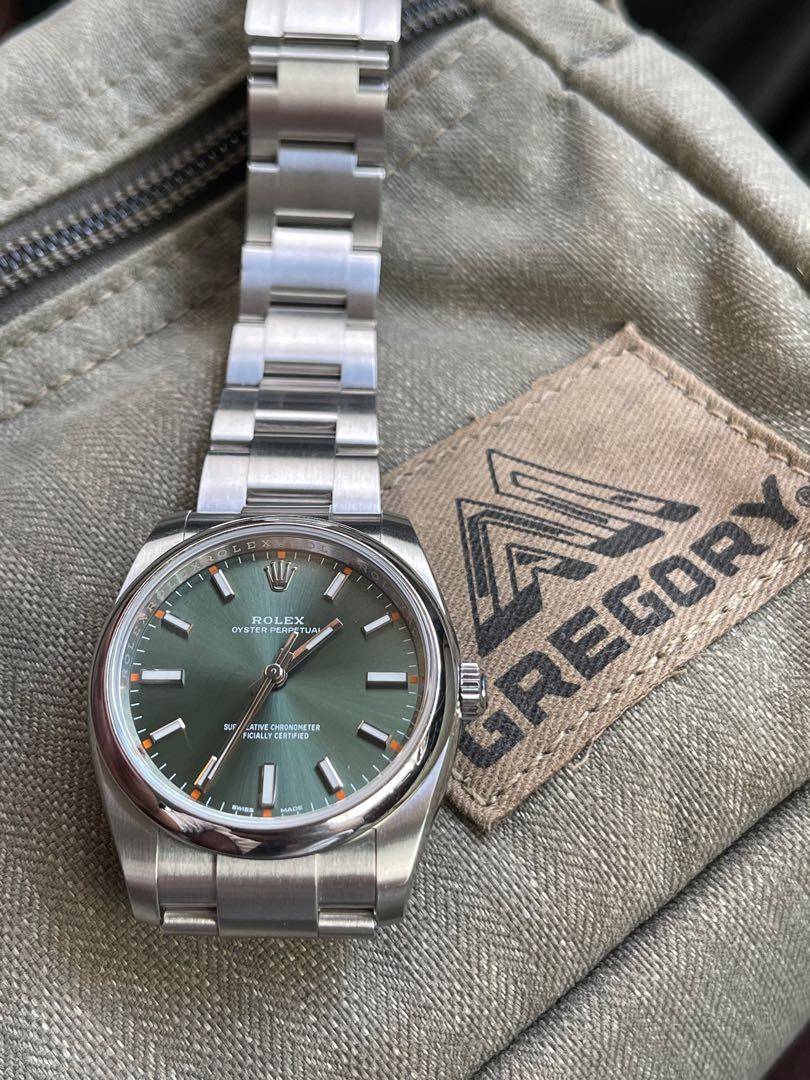 rolex_oyster_perpetual_olive_g_1613194642_60ca27d0.jpg