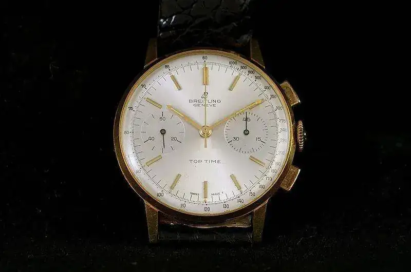 s-vintage-breitling-top-time-18k-gold-box-papers-3.webp