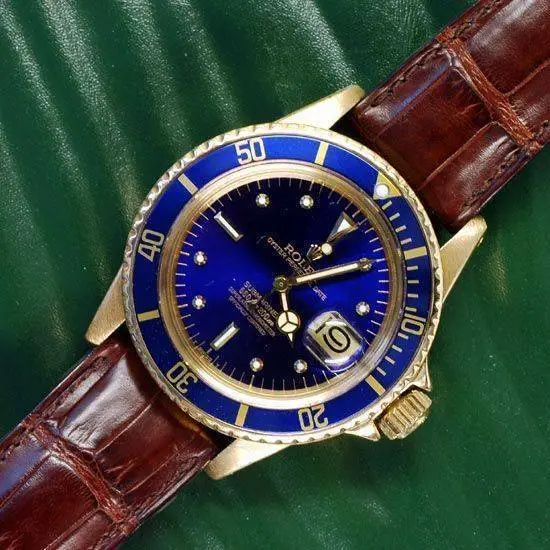 submariner-18k-gold-1680-plexi-blue-dial-1979-20640-en-G.webp