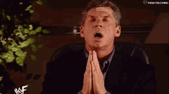 vince-mc-mahon-pray.gif