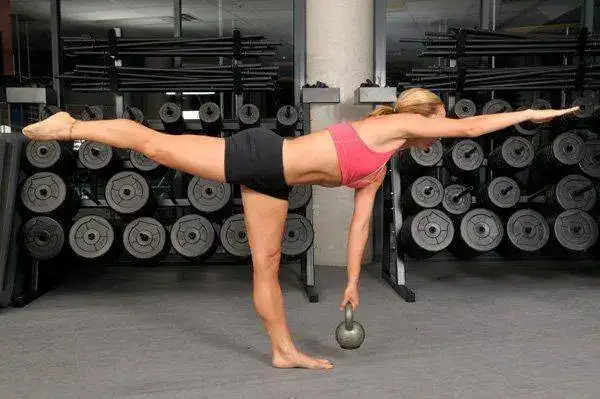 woman-using-kettlebell.webp