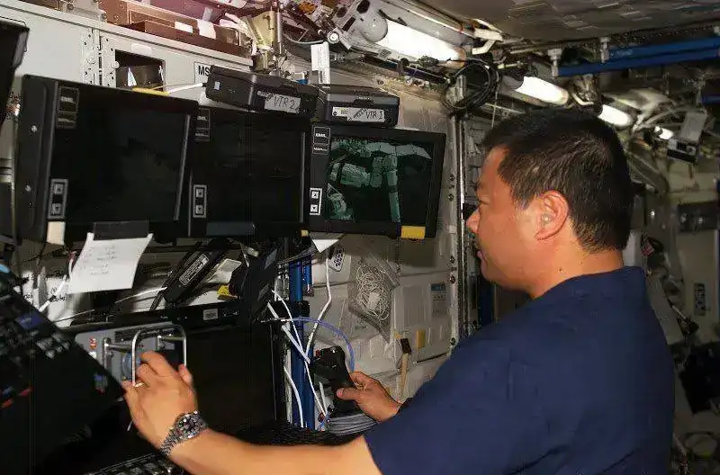 working_on_Space_Station_Remote_Manipulator_System.webp