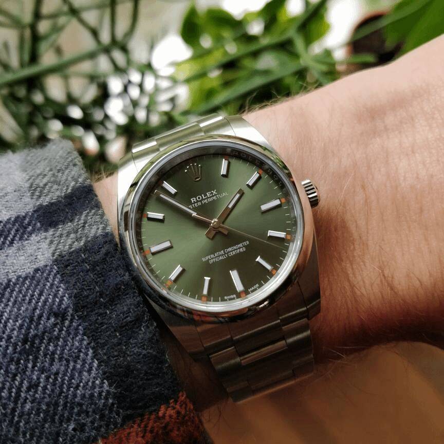 wts-2019-rolex-oyster-perpetual-ref-114200-olive-green-dial-v0-10r497r6mbfb1.png